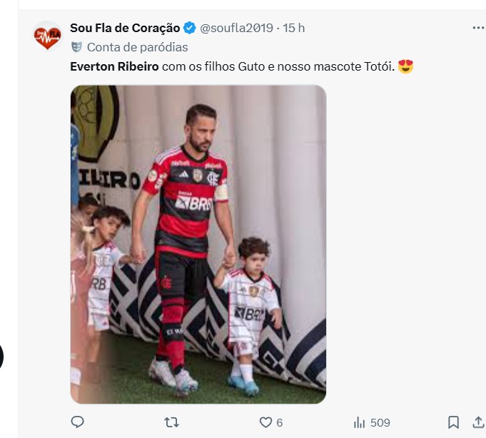 Éverton Ribeiro entra em campo com os filhos Guto e Emanuel, vestindo o uniforme do Flamengo, em momento marcante com a família no Maracanã.
